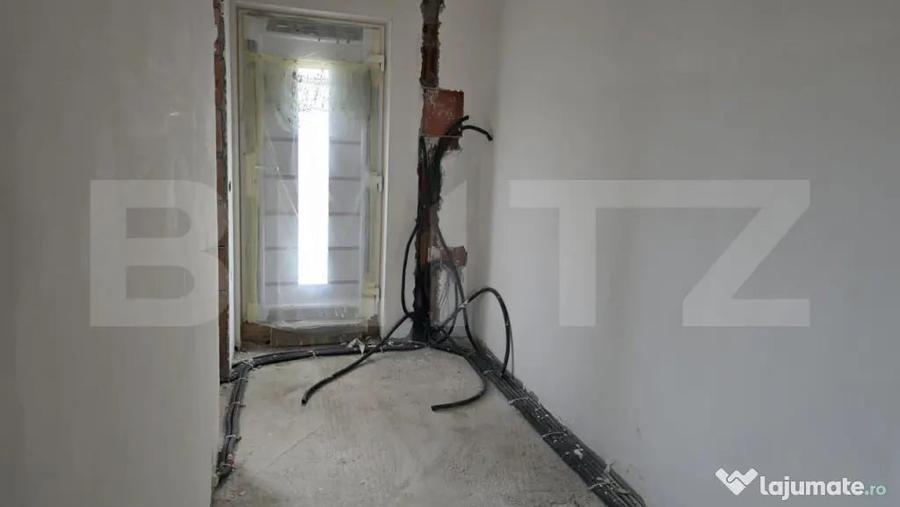 Casă cu 4 camere cu Teren 420 Mp în Periferie
