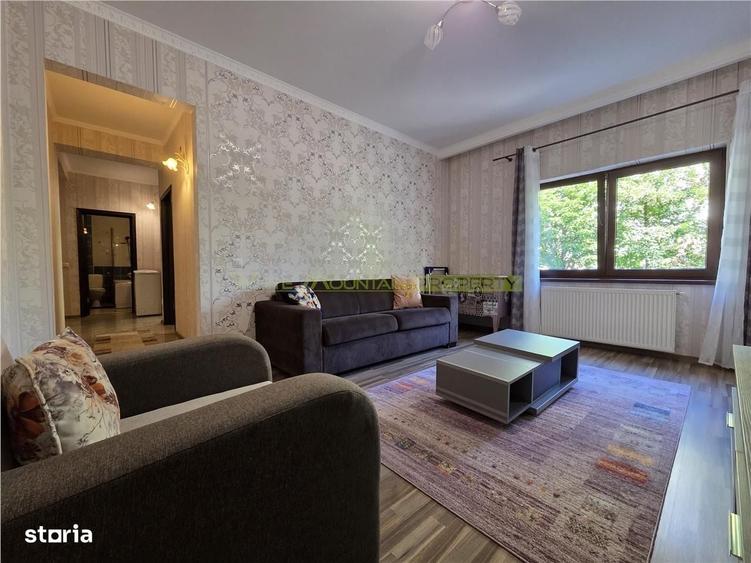 Apartament central cu acces la gradina si 2 locuri parcare - 1