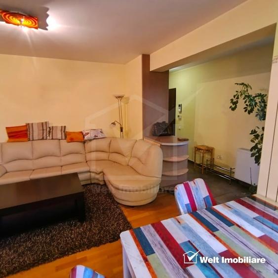 Apartament cu 3 camere semidecomandat, mobilat în Central — fotografia 3
