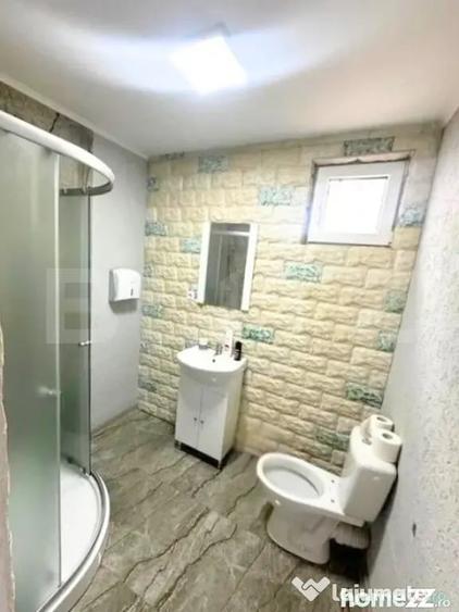 Casă cu 7 camere cu Teren 400 Mp în Central