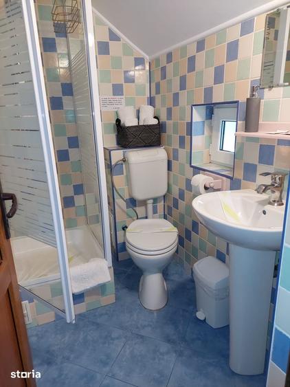 Casă cu 10 camere cu Teren 1292 Mp în Moieciu