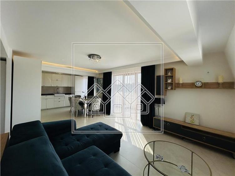 Ap pe 2 niveluri, 75 mp utili + 2 balcoane, mobilat modern - 10