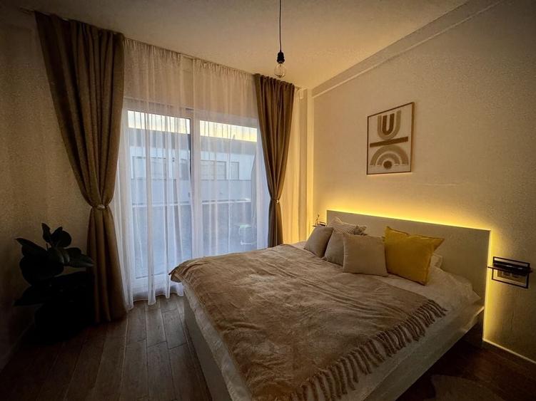 Apartament cu 2 camere decomandat în Sânmartin