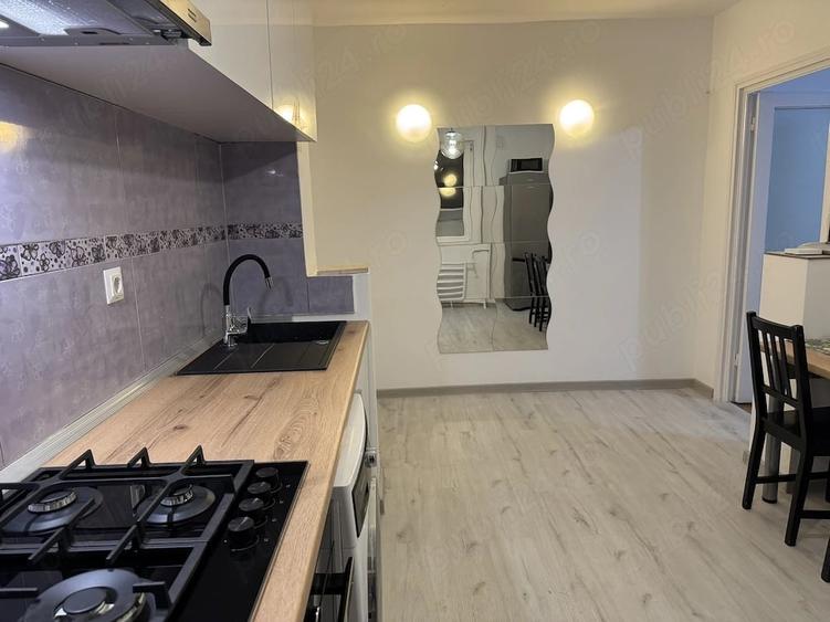Apartament cu 3 camere semidecomandat în 1 Mai