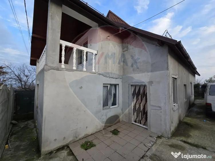 Casă cu 4 camere cu Teren 405 Mp în Periferie