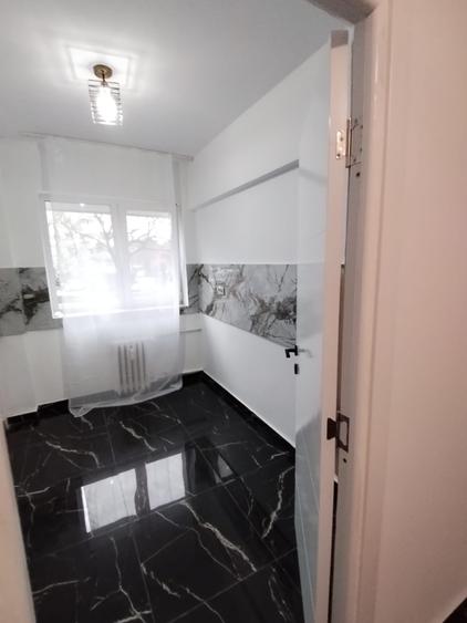 Apartament cu 2 camere semidecomandat în Podu Roș