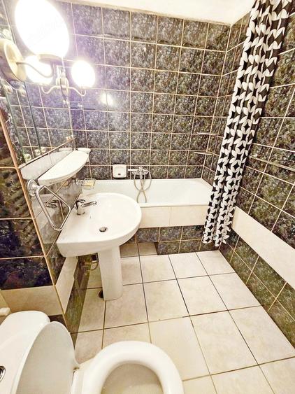 Apartament cu 4 camere semidecomandat în Dorobanților