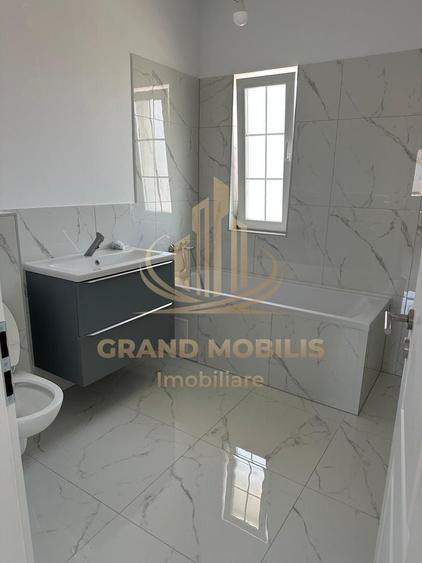 Casă individuală cu 4 camere cu Canalizare în Moșnița Nouă