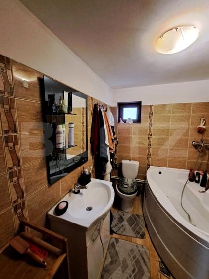 Casă individuală cu 4 camere cu Canalizare în Sânpetru