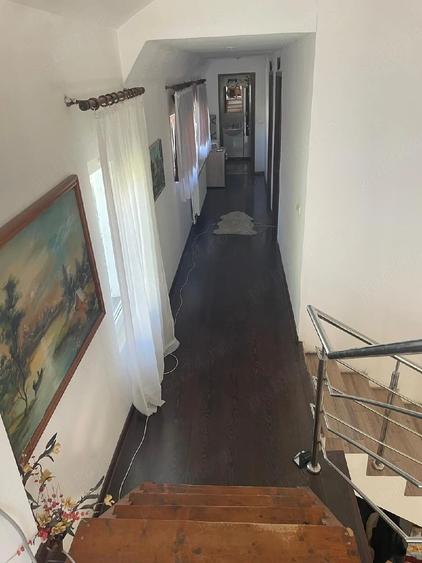 Casă cu Teren 1000 Mp în Central
