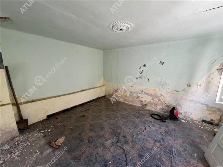 Casă individuală cu 5 camere cu Teren 489 Mp în Central