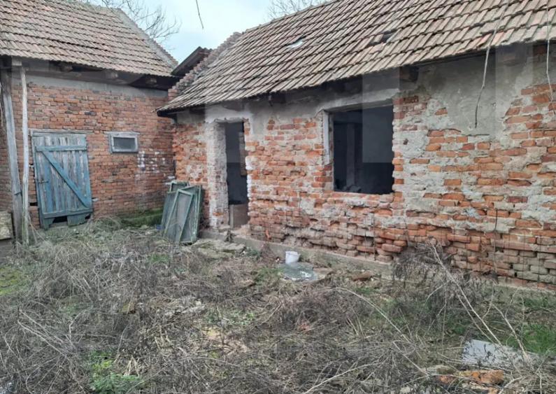 Casă cu 4 camere cu Teren 1000 Mp în Central