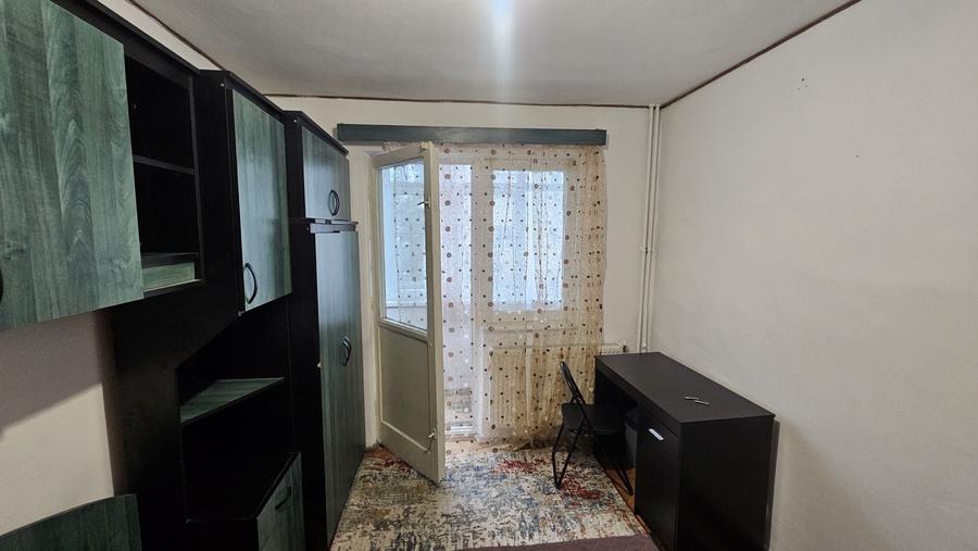 Inchiriez o camera intr-un apartament cu 2 camere - 2