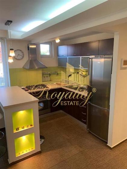 Apartament cu 2 camere semidecomandat, mobilat în Central