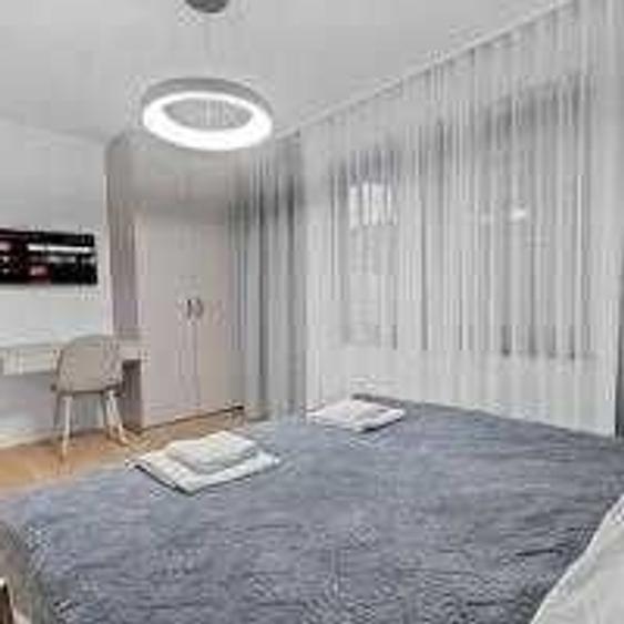 Apartament cu 2 camere decomandat în Poiana Brașov