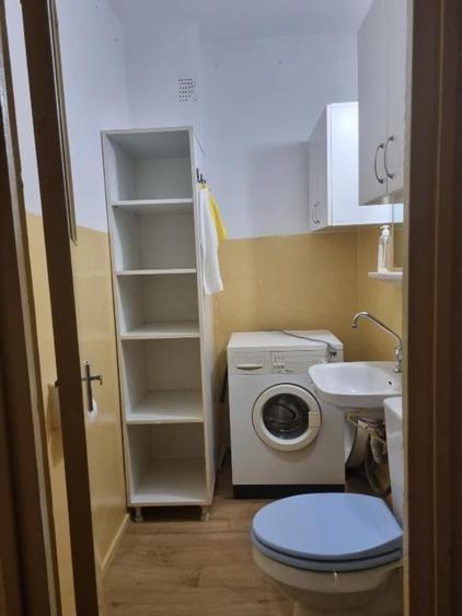 Apartament cu 3 camere decomandat în Podul de Fier