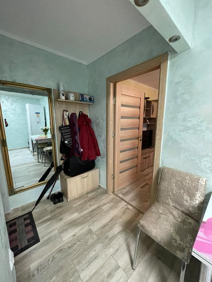 Apartament cu 2 camere semidecomandat, mobilat în Podu Roș