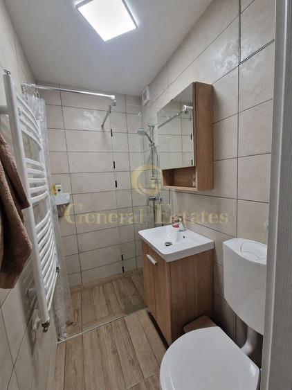 Apartament cu 2 camere semidecomandat, mobilat în Tractorul