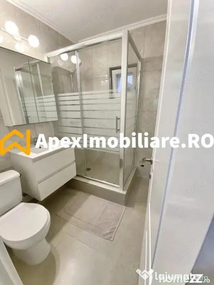 Apartament cu 3 camere semidecomandat, mobilat în Central