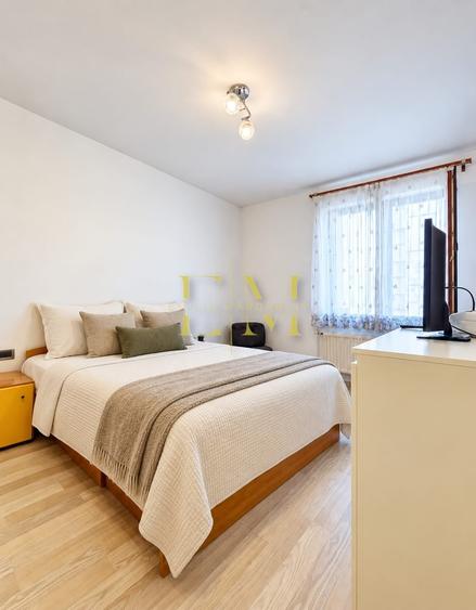 Apartament cu 3 camere semidecomandat în Tractorul