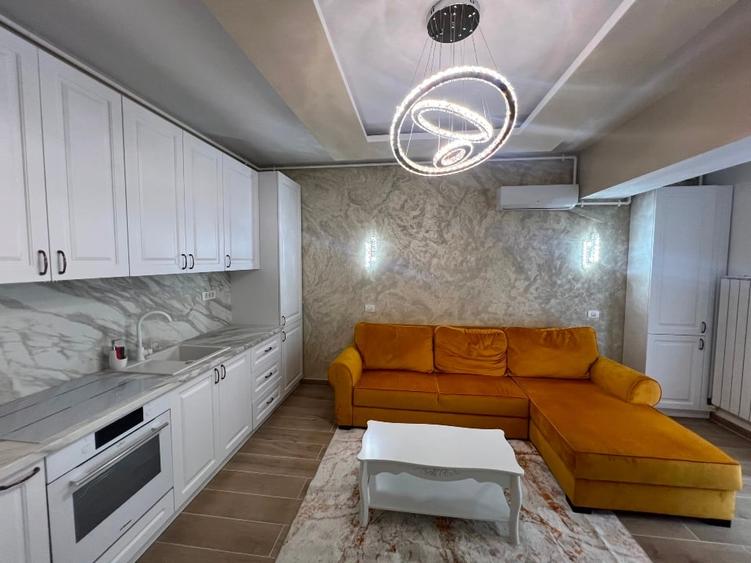 Apartament cu 2 camere semidecomandat, mobilat în Central