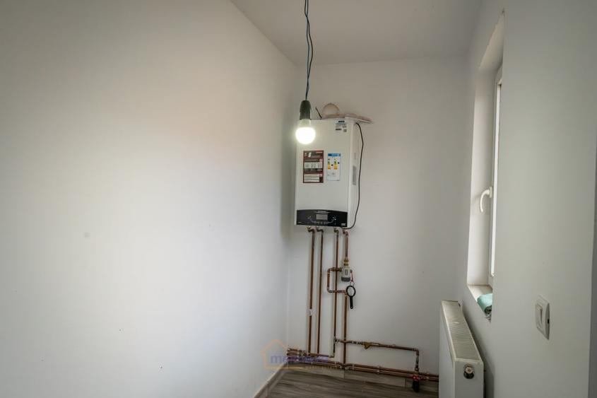 Casă cu 3 camere cu Teren 400 Mp în Comănești