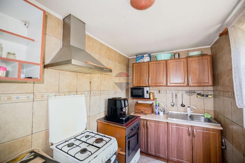 Casă individuală cu 5 camere cu Teren 490 Mp în Central