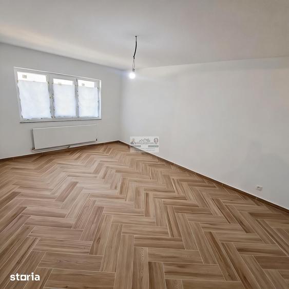 Apartament cu 4 camere decomandat în Străoane