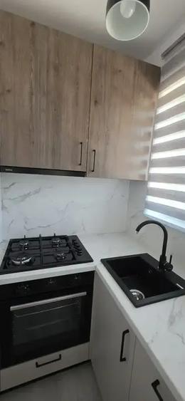 Apartament cu 2 camere semidecomandat, mobilat în Central