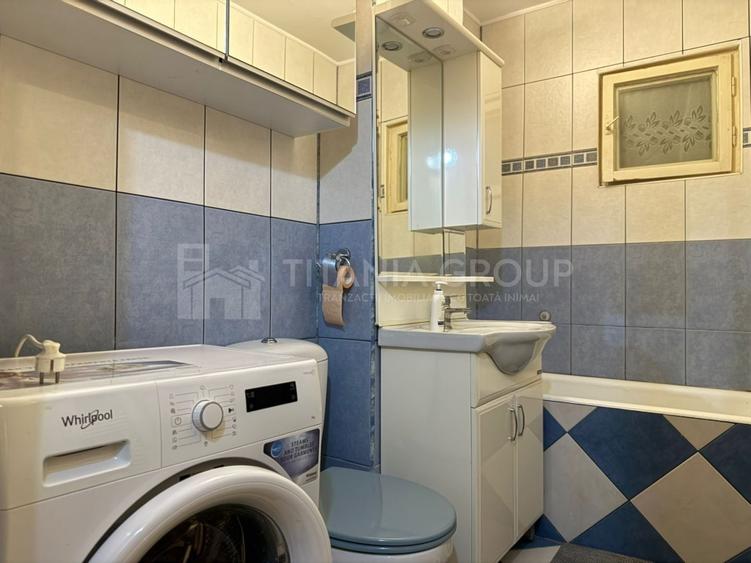 Apartament cu 2 camere, 2 bai, decomandat, etaj 1 - zona Racadau - 7