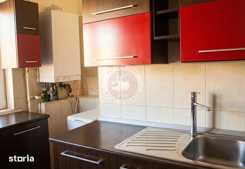 Apartament cu 5 camere decomandat în Romană