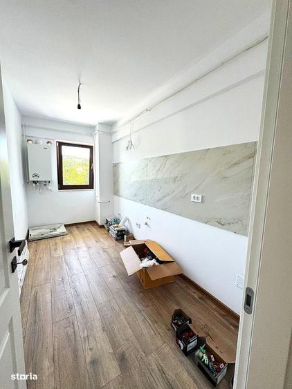 Apartament cu 2 camere decomandat în Bucium — fotografia 1