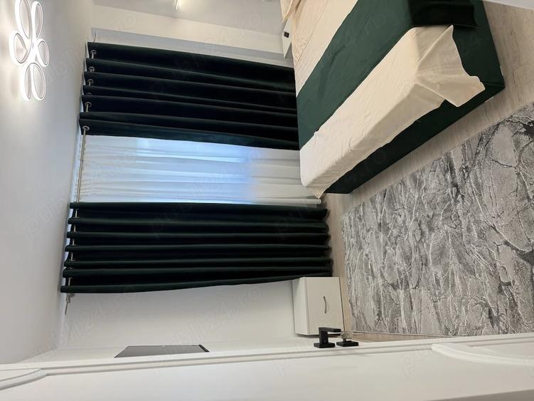 Apartament cu 4 camere decomandat în Central