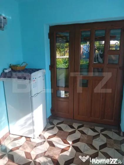 Casă cu 2 camere cu Teren 3800 Mp în Central