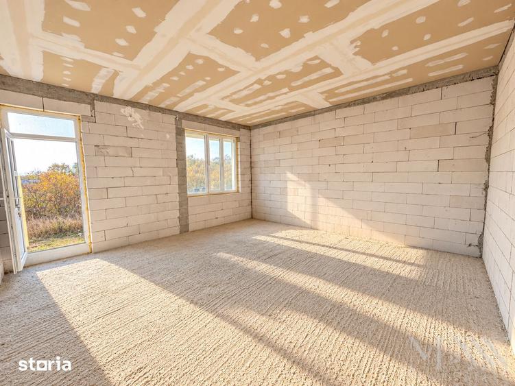 Casă cu 4 camere cu Teren 553 Mp în Sânmartin