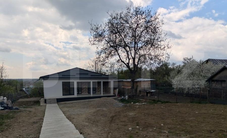 Casă individuală cu 3 camere cu Teren 900 Mp în Răzvad