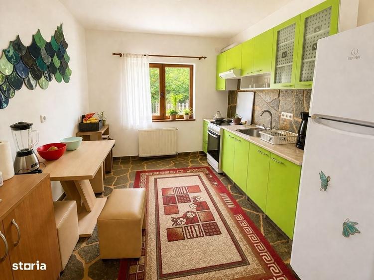 Casă cu 4 camere cu Teren 1000 Mp în Bucium