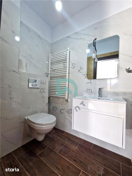 Apartament cu 3 camere decomandat în Tractorul