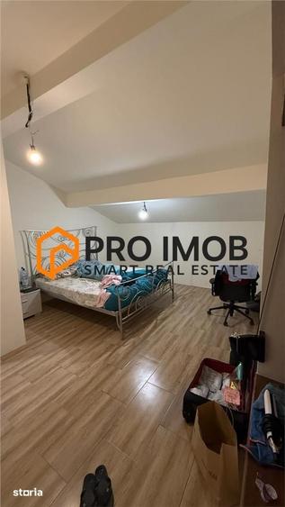 Casa tip P+M si garaj zona Spataru - Costesti - 6