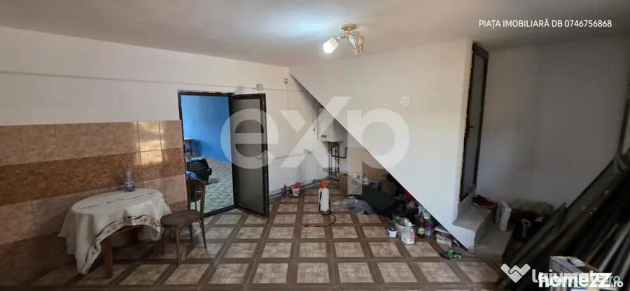 Casă cu 3 camere cu Teren 1000 Mp în Răzvad