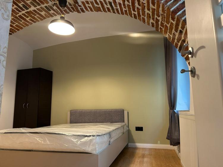 Apartament cu 2 camere semidecomandat, mobilat în Centrul Istoric