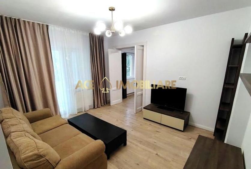 Apartament cu 3 camere semidecomandat, mobilat în 1 Mai