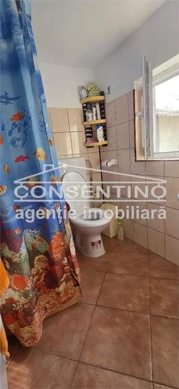 Casă cu 3 camere cu Teren 1439 Mp în Movila Banului