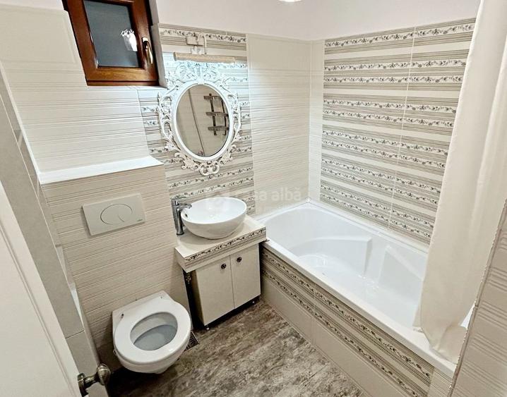 Apartament cu 7 camere decomandat în Bucium