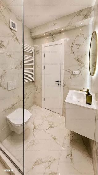 Apartament cu 3 camere decomandat în Tractorul