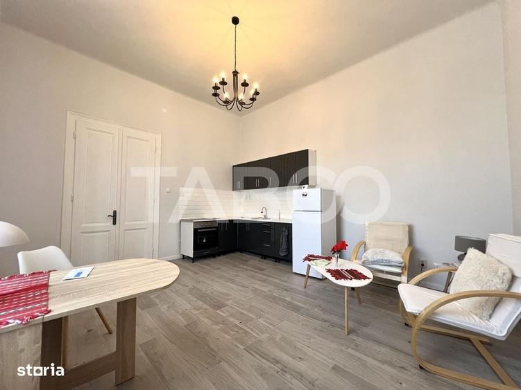 Apartament cu 3 camere si terasa de 14 mp de vanzare in zona Centrala - 1