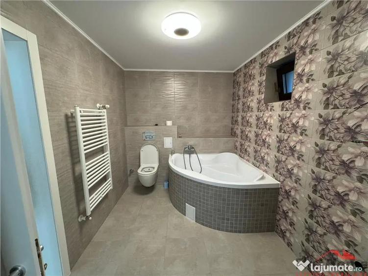 Cladire cu 3 apartamente in suprafata totala construita de 5 - 12