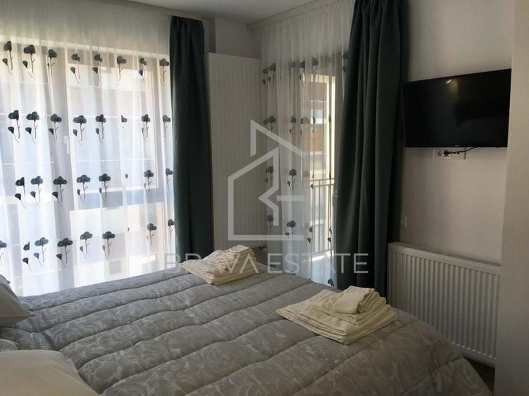 Apartament cu 2 camere semidecomandat, mobilat în Bună Ziua