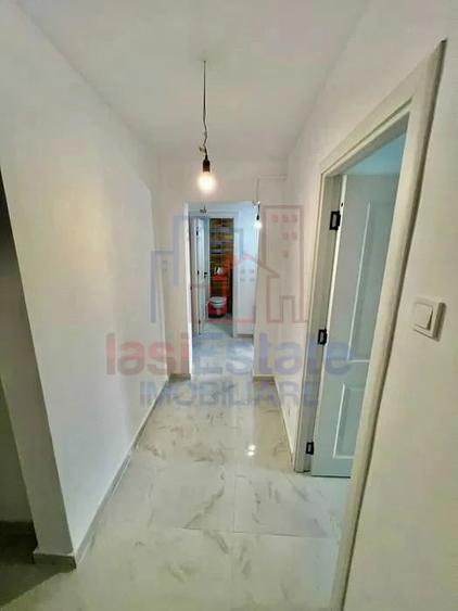 Apartament cu 4 camere decomandat în Filiași