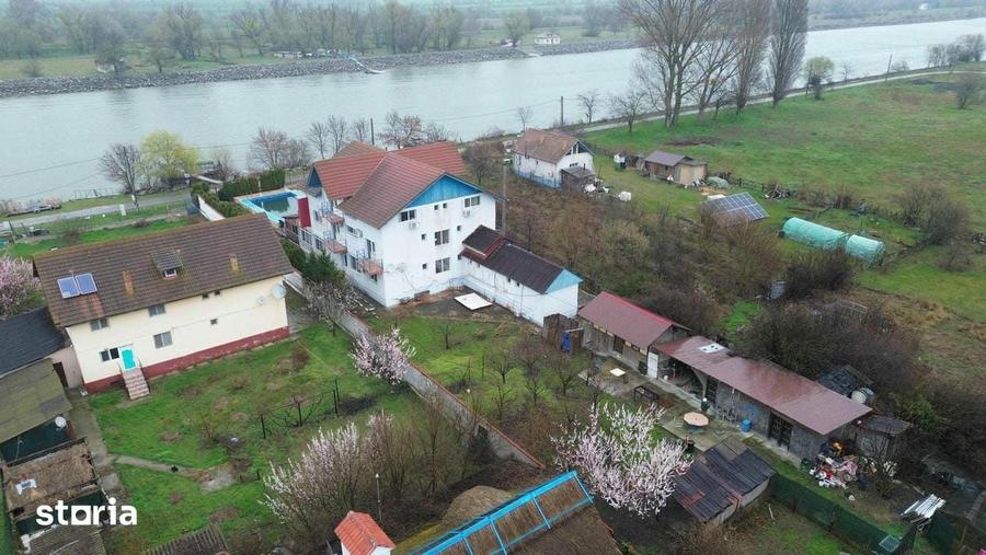 Casă cu 9 camere cu Teren 2035 Mp în Maliuc